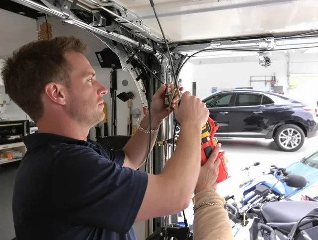 Seal Beach Garage Door Repair safety certified technician performing cable replacement in Seal Beach