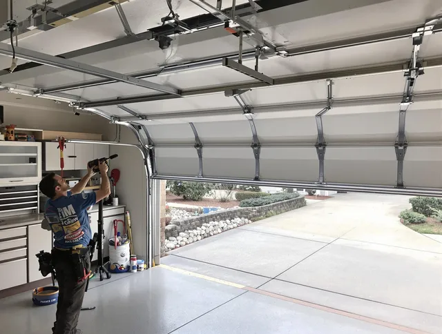 Garage door track repair service by Seal Beach Garage Door Repair in Seal Beach